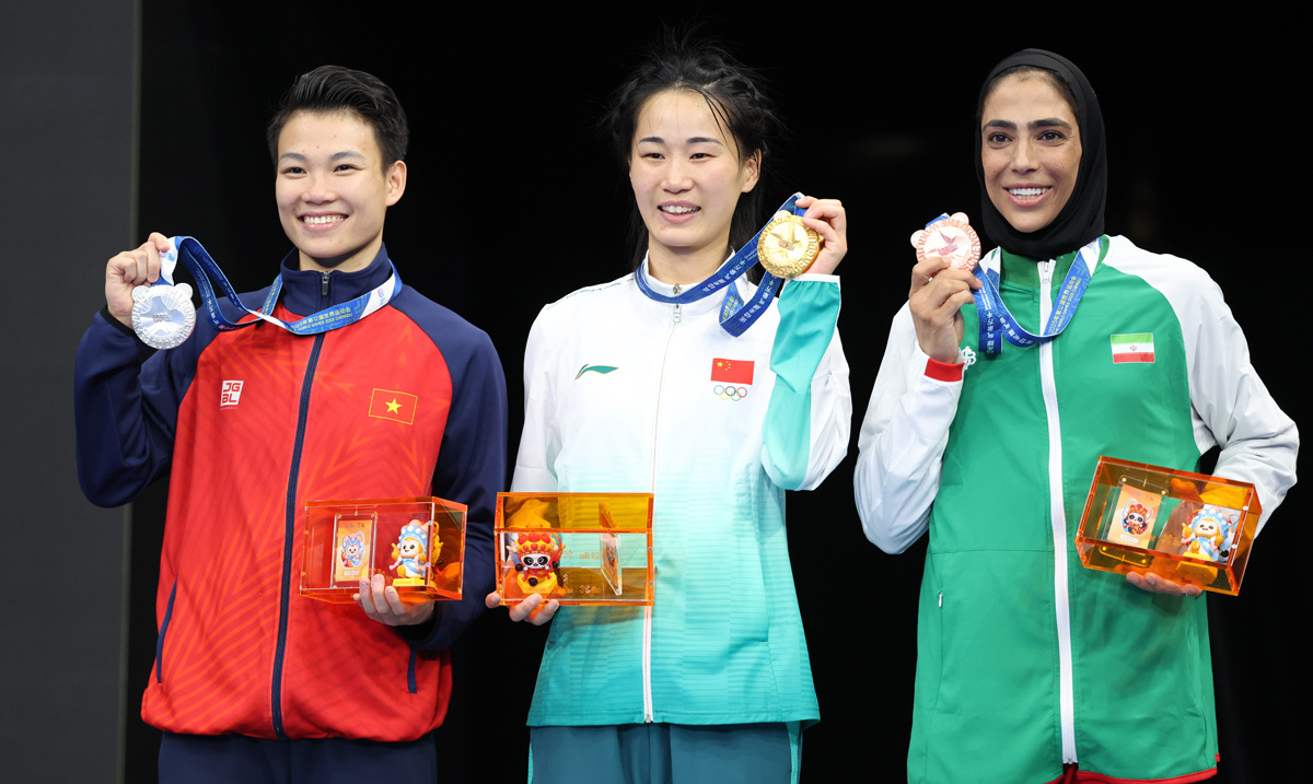 中國選手李志勤奪得武術(shù)散打女子60公斤級冠軍